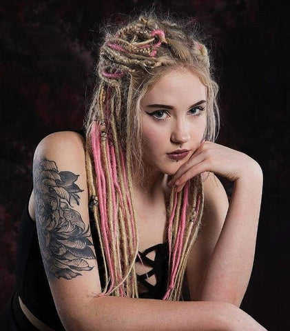 Pink and blonde synthetic dreadlock extensions